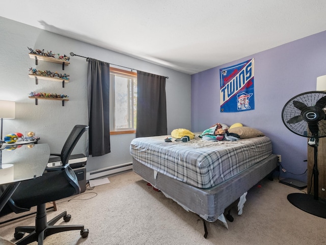 carpeted bedroom with a baseboard heating unit