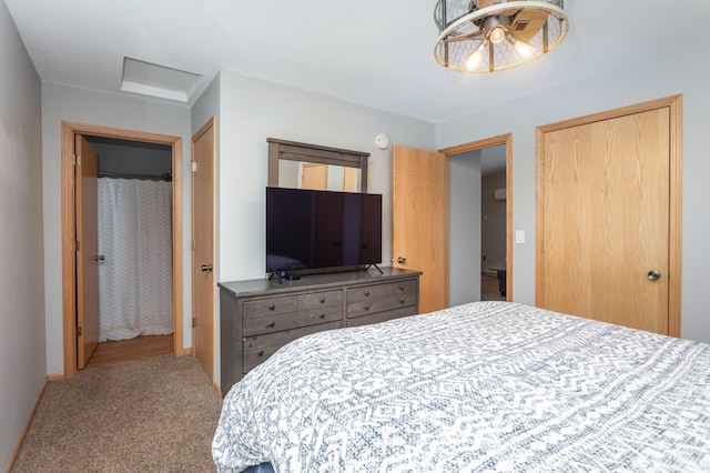 carpeted bedroom with a closet