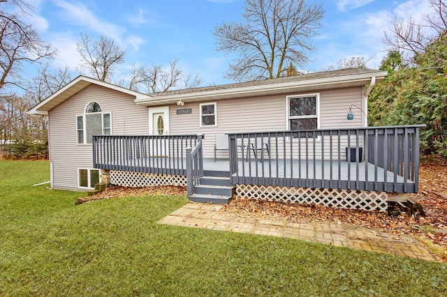 11421 Abby Ln NW, Alexandria, MN 56308 - back of property featuring a yard and a deck