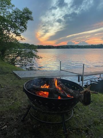 11421 Abby Ln NW, Alexandria, MN 56308 - dock area with a fire pit and a water view