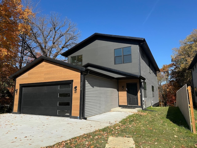 view of front of property featuring a garage