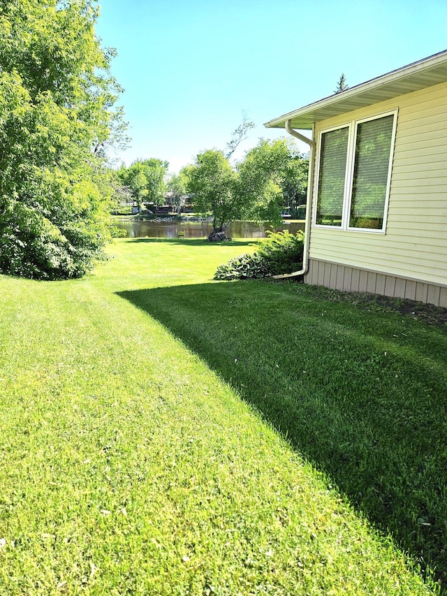 view of yard with a water view