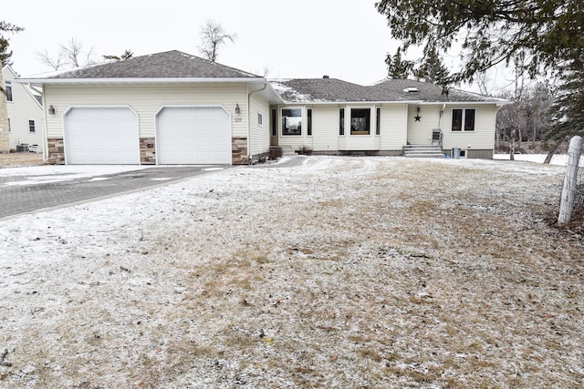 single story home with a garage