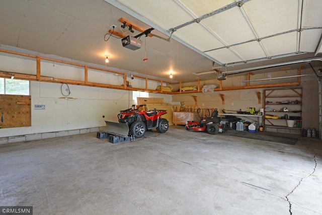 garage featuring a garage door opener