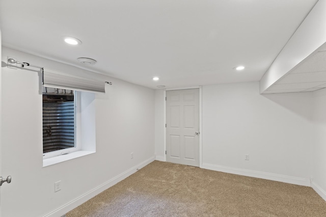 basement featuring carpet flooring