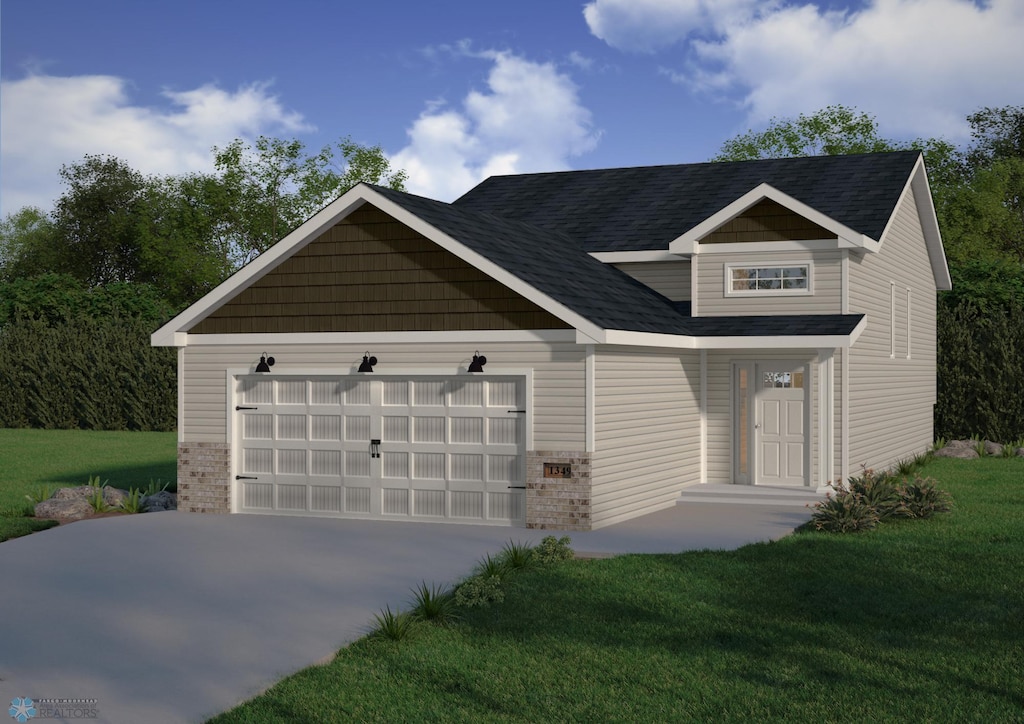 craftsman-style home featuring a front yard and a garage