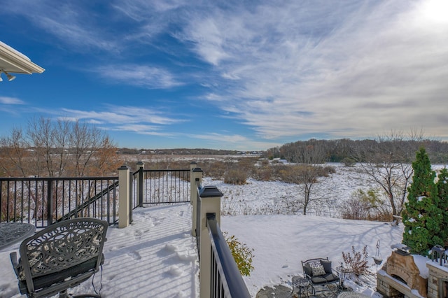 view of snow covered deck