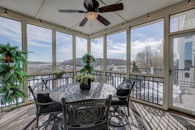 sunroom / solarium with ceiling fan