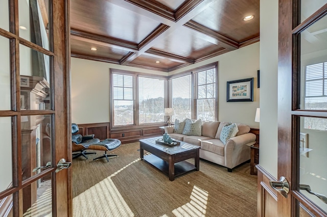 interior space with beamed ceiling, french doors, crown molding, and coffered ceiling