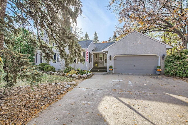 single story home with a garage