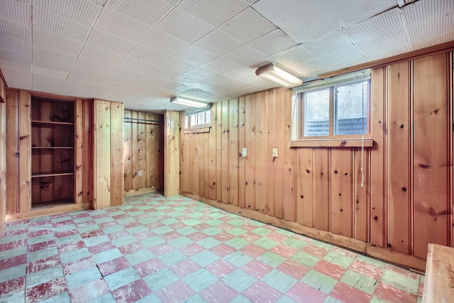 basement with wood walls