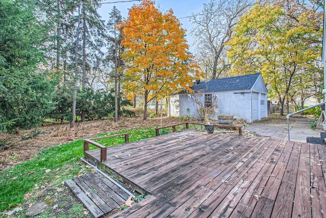 deck with an outdoor structure