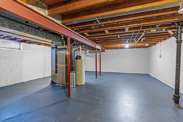 unfinished basement with heating unit and gas water heater