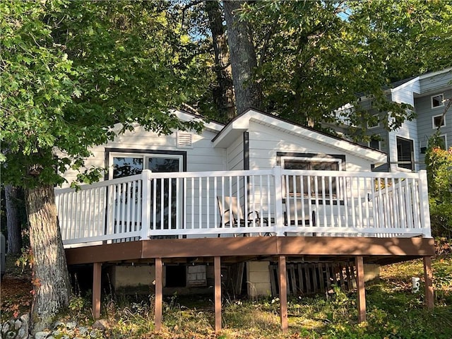 back of property with a deck