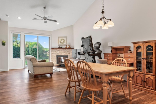 646 Shardlow Pl NE, Byron, MN 55920 - dining space with recessed lighting, vaulted ceiling, a ceiling fan, dark wood-style floors, and a stone fireplace