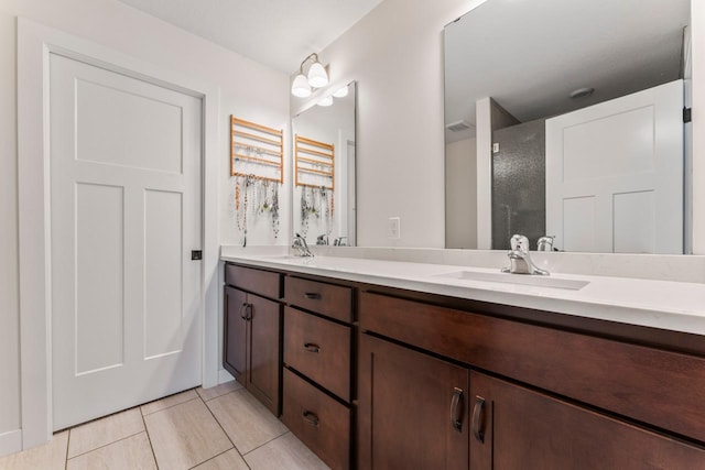 646 Shardlow Pl NE, Byron, MN 55920 - bathroom featuring a sink, double vanity, walk in shower, and visible vents