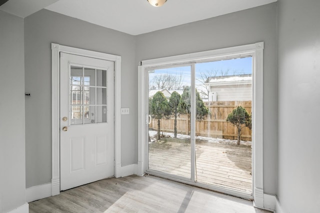 doorway featuring light hardwood / wood-style floors