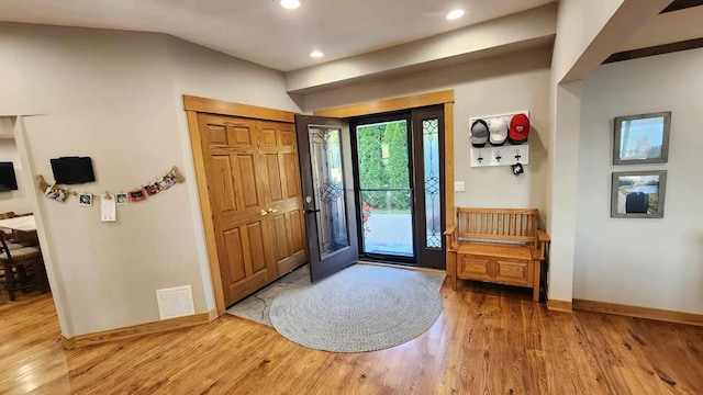 entrance foyer featuring hardwood / wood-style floors