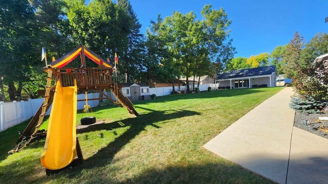 view of jungle gym with a yard