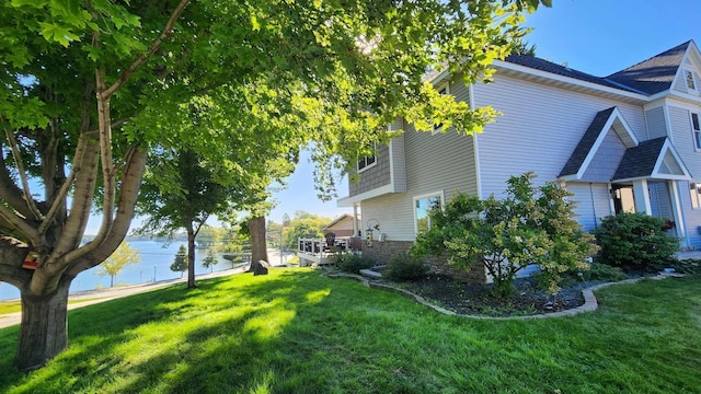 view of yard with a water view