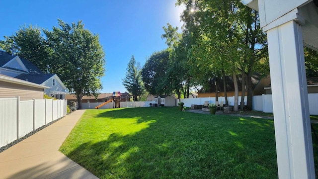 view of yard with a playground