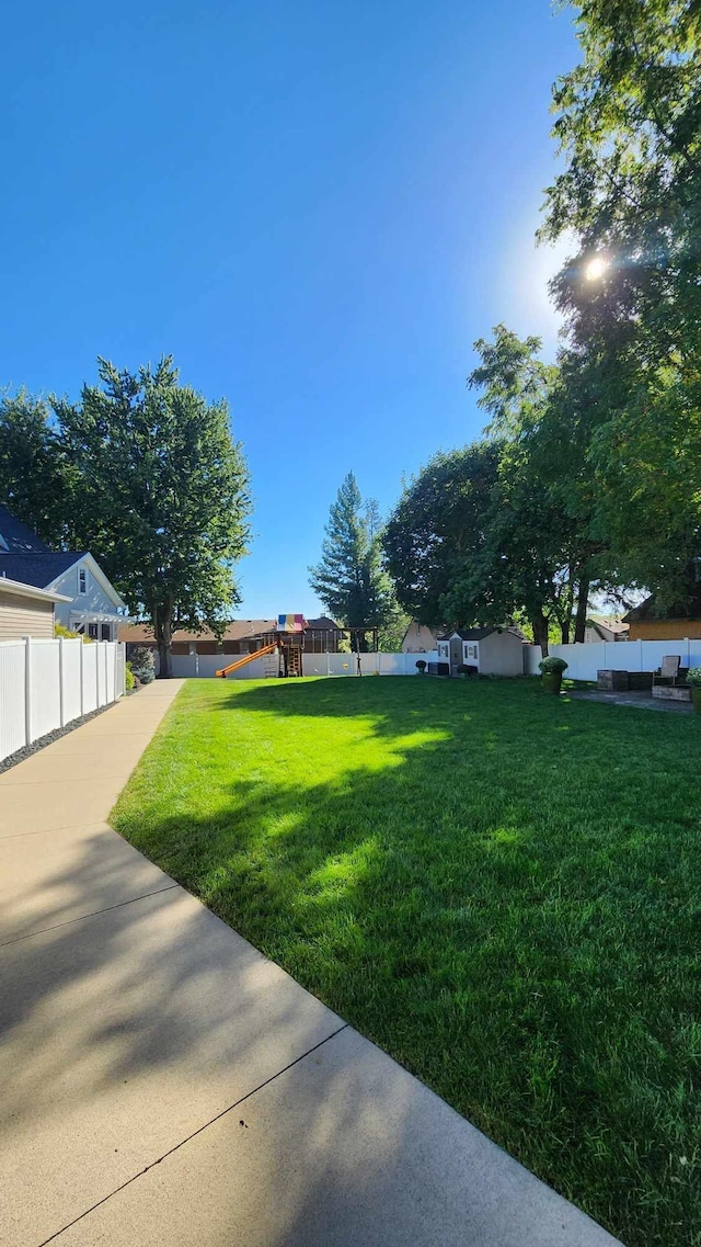 view of yard with a playground