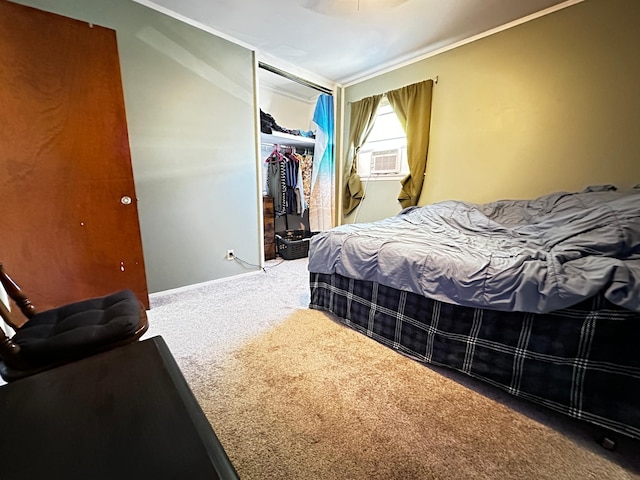 bedroom featuring cooling unit, carpet flooring, and a closet