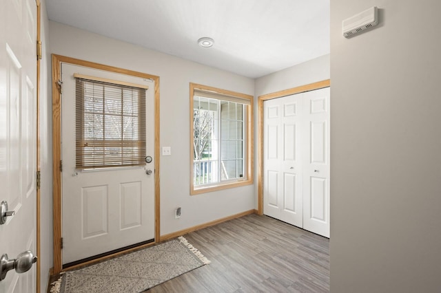 foyer entrance featuring light hardwood / wood-style floors