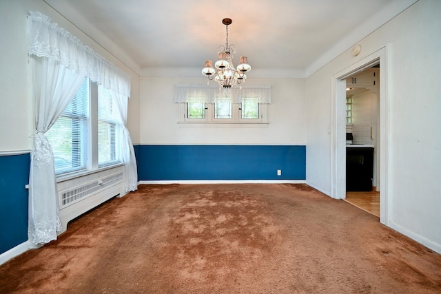 unfurnished dining area with carpet floors and a notable chandelier