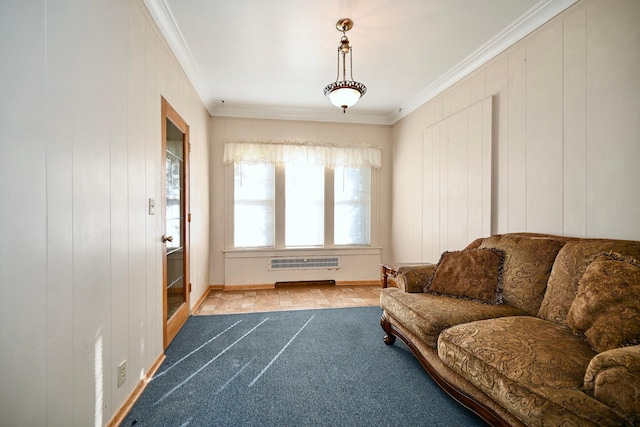 living area featuring crown molding