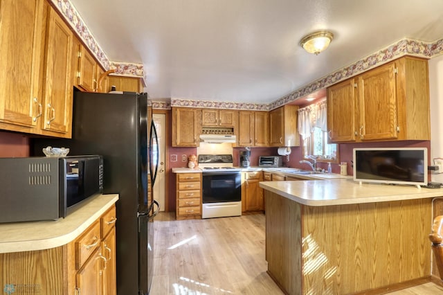 kitchen with light wood-type flooring, sink, ventilation hood, kitchen peninsula, and white range with electric stovetop