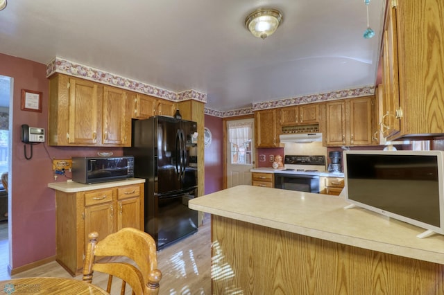 kitchen with black fridge, kitchen peninsula, light hardwood / wood-style flooring, exhaust hood, and white electric range oven