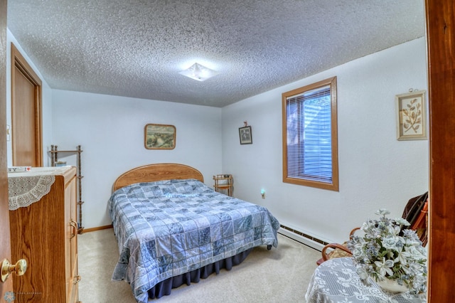 bedroom featuring light colored carpet, a textured ceiling, and baseboard heating