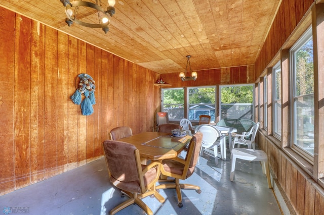 sunroom with an inviting chandelier, wooden ceiling, and a wealth of natural light