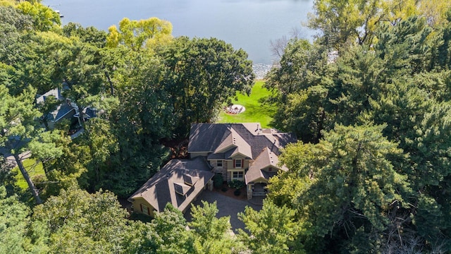 birds eye view of property featuring a water view