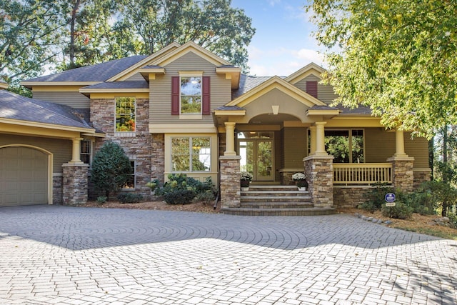 craftsman house with a garage