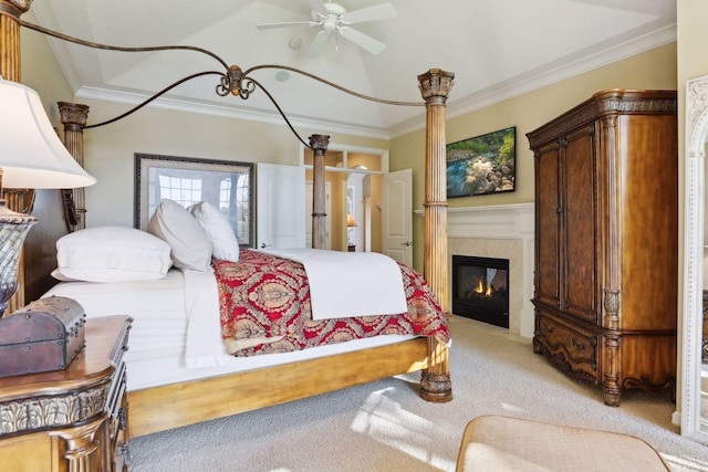 carpeted bedroom featuring ornamental molding and ceiling fan