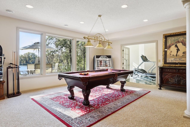 playroom with ornate columns, a textured ceiling, billiards, and carpet flooring