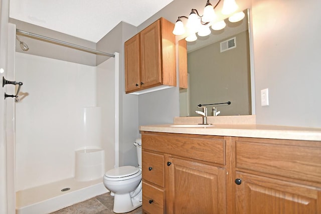 full bath with toilet, visible vents, walk in shower, and vanity