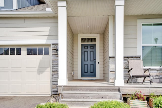 doorway to property featuring a garage