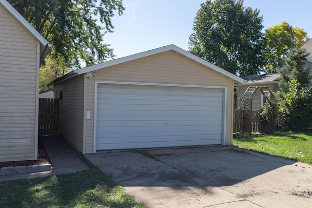 detached garage with fence