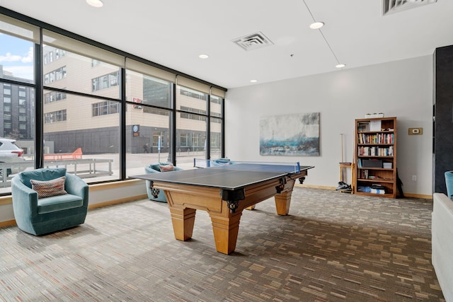 740 Portland Ave Unit 1207, Minneapolis, MN 55415 - recreation room with carpet flooring, a healthy amount of sunlight, and visible vents