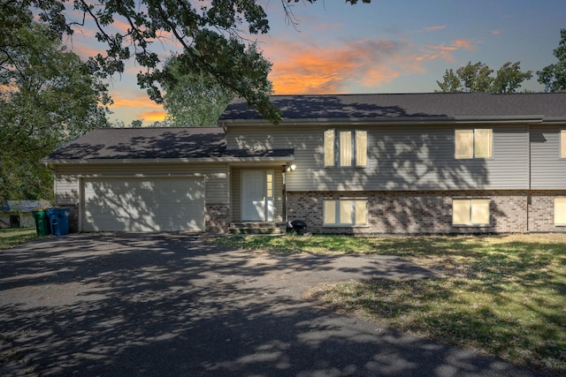 view of front of property featuring a garage