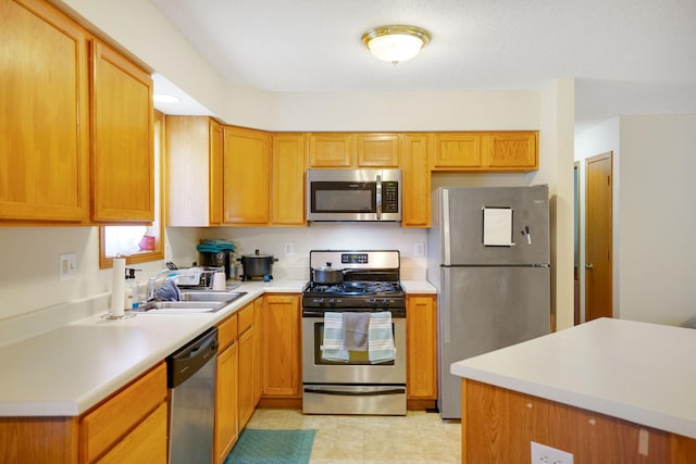 kitchen with stainless steel appliances and sink