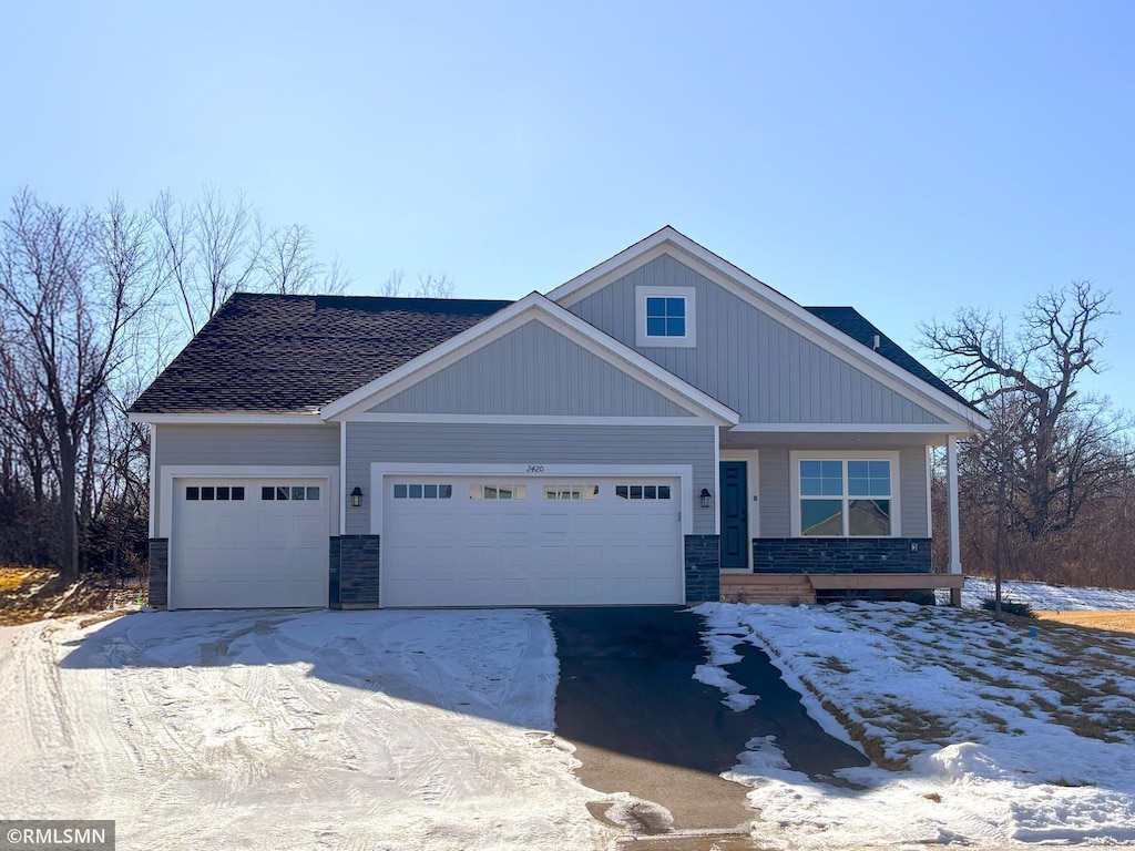 view of front of property with a garage