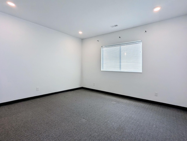 spare room with carpet floors