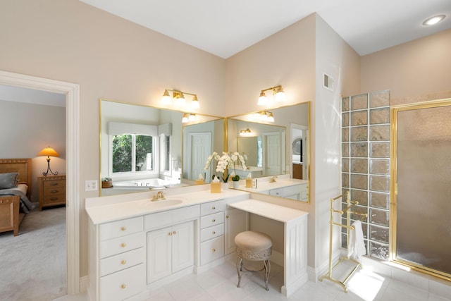 bathroom with tile patterned floors, an enclosed shower, and vanity