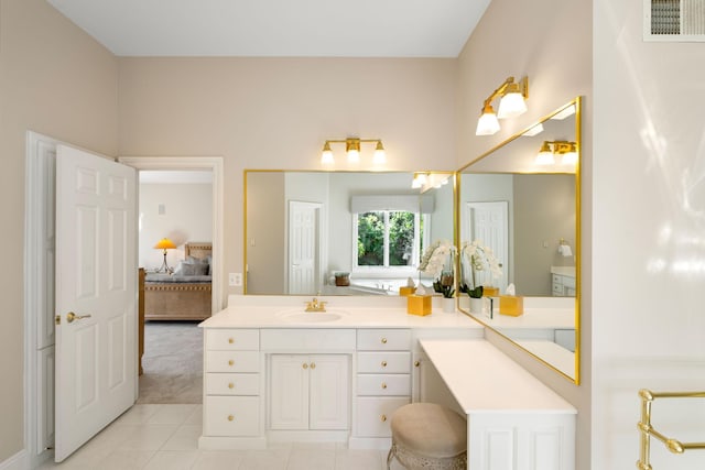 bathroom featuring tile patterned floors and vanity