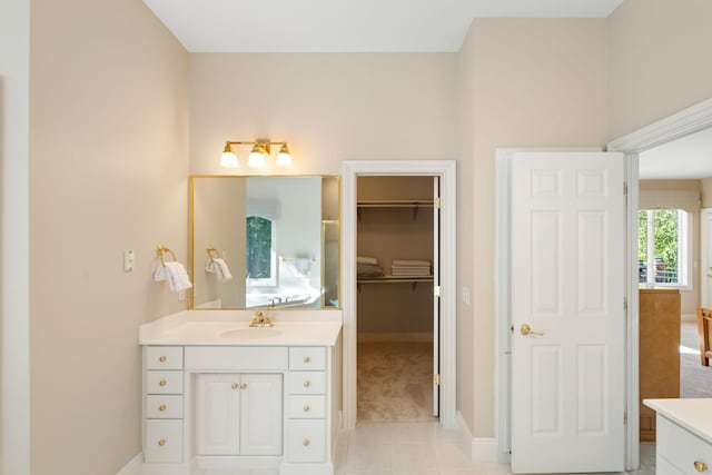 bathroom with vanity and tile patterned floors