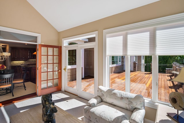 living room with lofted ceiling and hardwood / wood-style flooring